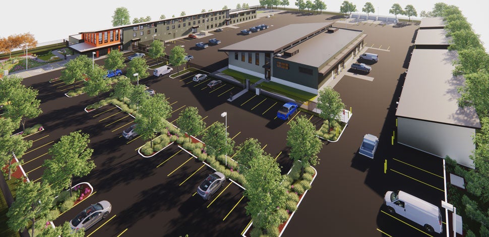 Architectural rendering of aerial view of a building and parking lot