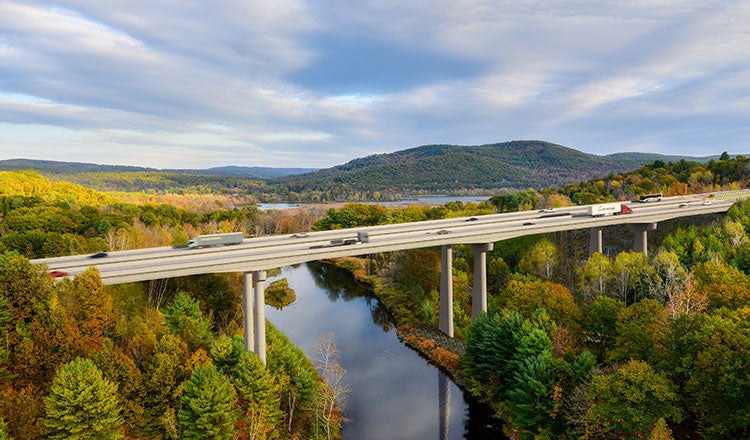 I-91 Rockingham Bridges project in action and surrounding scenic background in Vermont.