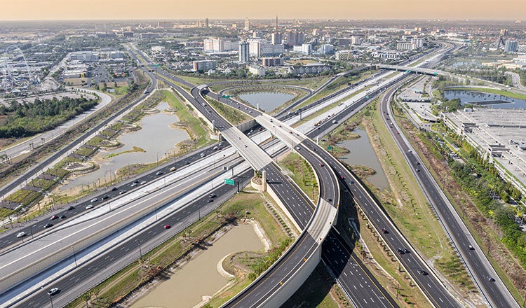 Aerial view of Interstate 4 interchange and surrounding Orlando metro.